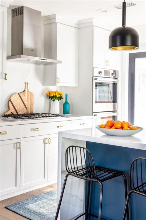 Shop wayfair for all the best white kitchen islands & carts. White Contemporary Kitchen With Blue Island | HGTV