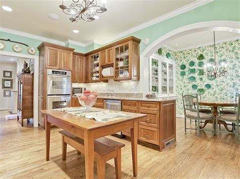 Sage green kitchen walls with oak cabinets. Pin by Emily scott on Backyard | Green kitchen walls, Home ...