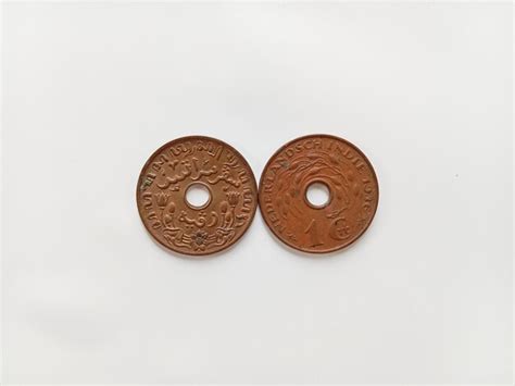 Premium Photo Two Copper Coins With The Word The Year On Them