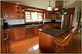 Granite Countertops With Cherry Wood Cabinets