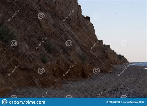 The Black Sea Coast Sandy Cliff And Blue Sky With Single Clouds In Summer Sunny Day Sanzhiika