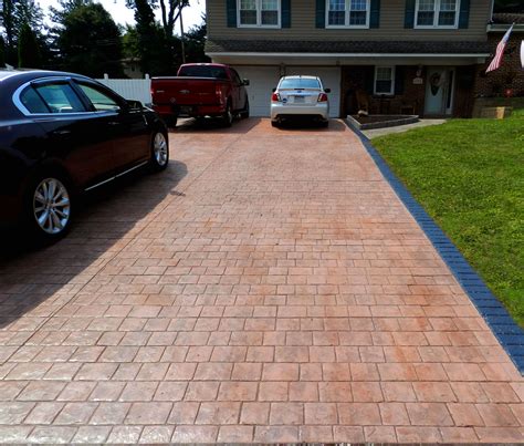 Stamped Concrete Driveway Cobble Stones Pattern With Brick Soldier