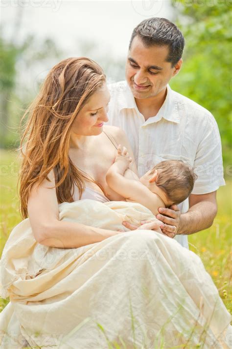 Woman Breastfeeding Husband