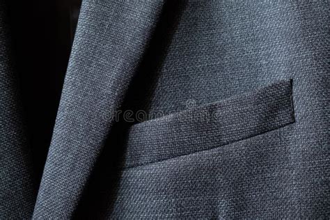 High Resolution With Details And Quality Shot Of Formal Black Or Dark Grey Wool Suit Fabric