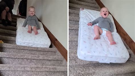 Fearless Toddler Slides Down The Stairs On A Mattress The Tango