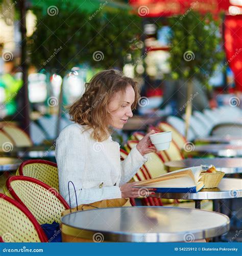 Beautiful Young Woman in Parisian Cafe Stock Photo - Image of drink