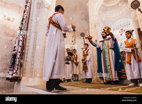 A Syriac Christian Priest Celebrating Mass At An Old Church In Stock