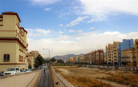 Malaga And Its View From The Bridge Puente De La Aurora Streching Over