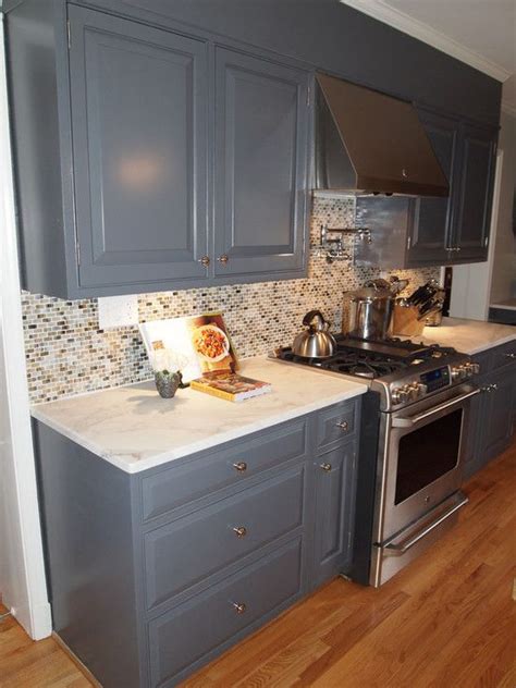Light green cabinets soften this kitchen's hardworking edges. Bethesda Residence | Interior design kitchen, New kitchen ...
