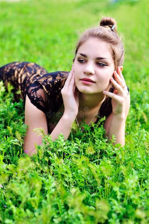 Girl Laying In Bright Green Grass Stock Image Image Of Positive Nature 14324613