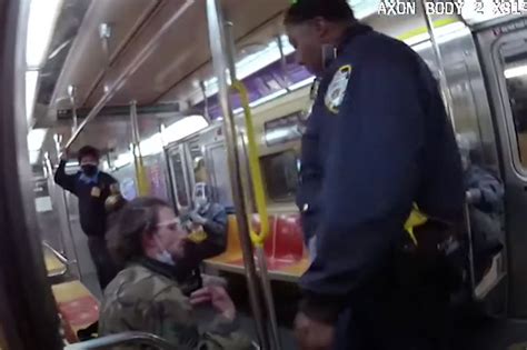 video shows cop punching homeless man on manhattan subway da vance charges rider with assault