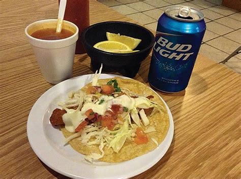 The fish tacos which are 99 cents every day. Tacos bulge with generosity at Mariscos Germán | San Diego ...