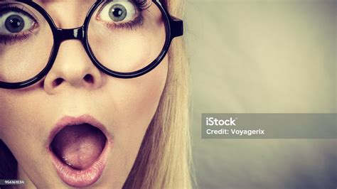 Closeup Woman Shocked Face With Eyeglasses Stock Photo Download Image