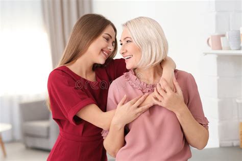 Portrait Of Mature Woman And Her Daughter Stock Image Image Of Female Clothes 140534345