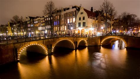 Night View Of Amsterdam City Netherlands 4k Wallpapers