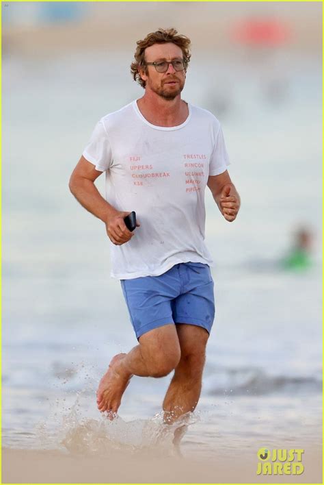 Simon Baker Goes For Dip In The Ocean While At The Beach With Son Harry