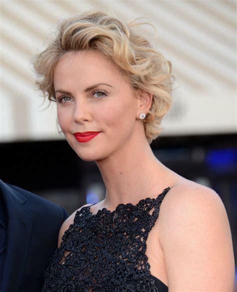 Charlize Theron Short Curled Hairstyle With The Hair Away From The Face