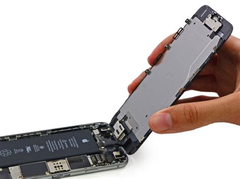 Once there's a tiny hole between the front and the back, stick in the plastic tool. iPhone 6 Teardown Reveals 1810 mAh Battery [Photos ...