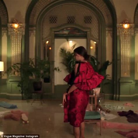 irina shayk does a sexy striptease for vogue magazine in video daily mail online