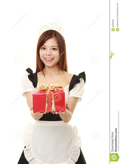 Young Japanese Woman Wearing French Maid Costume Offering