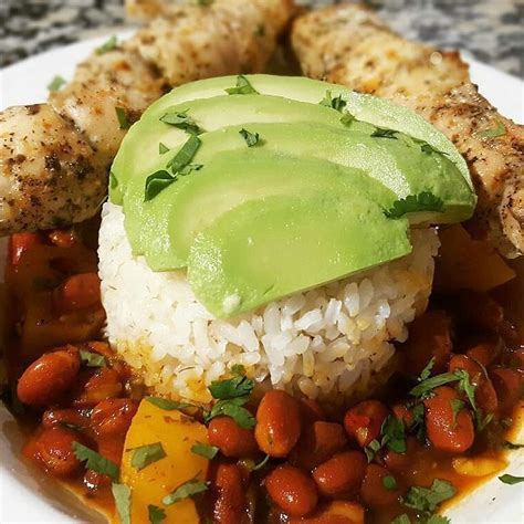 Cook for 4 minutes, making sure not to burn garlic. Puerto Rican style white rice pink beans with olives and potatoes chicken kebabs and avocado. # ...