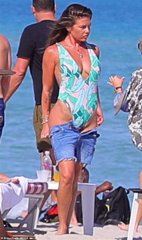 Chanel West Coast Showcases Fit Figure And Sunburn In Plunging One Piece Swimsuit In Miami