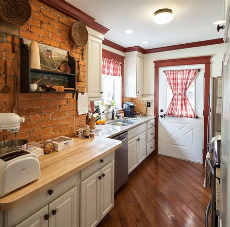 Kitchen utensils and tableware on wooden shelves. 50 Trendy and Timeless Kitchens with Beautiful Brick Walls