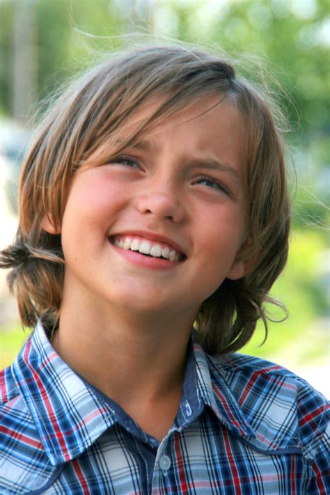 Huge collection of videos (over 120,000 movies and tv shows on one site). Portrait of a beautiful boy with an innocent expression on ...