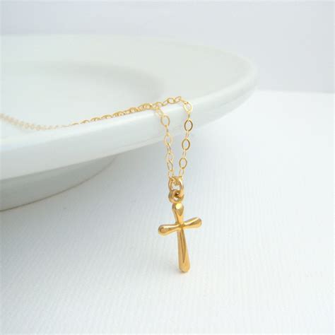 Using a thick link will give the chain a. tiny gold cross necklace. small rounded cross. 14k gold filled