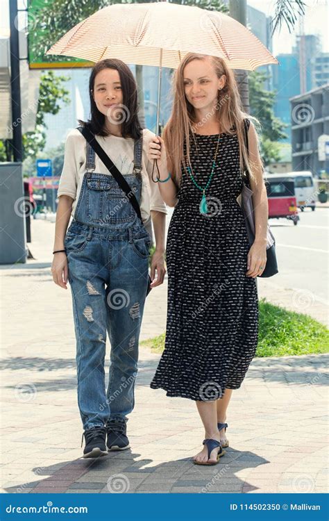 Two Girls Walking Around The City Stock Photo Image Of Holiday