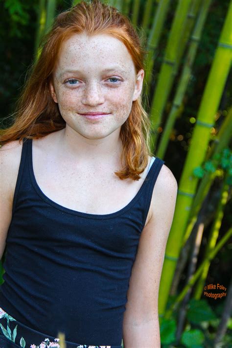 Ginger Hair Pre Teen Young Girl With Lots Of Freckels 12 Year Old Readhead Red Hair In