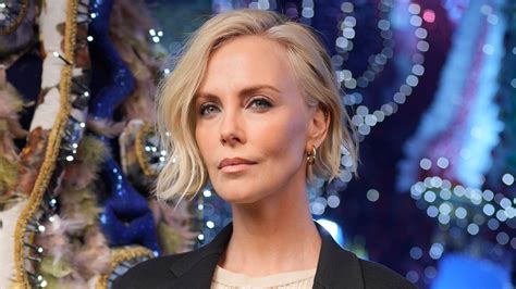 charlize theron claps back at speculation she got a facelift and gets candid on aging double
