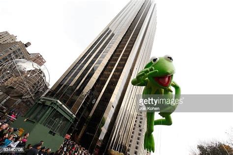 A Kermit The Frog Balloon Floats Over The Streets Of Manhattan During