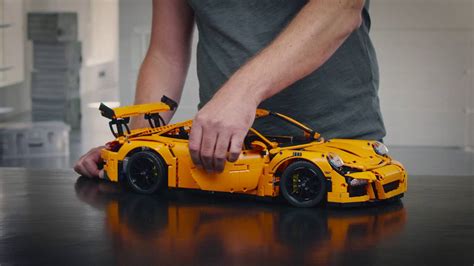 When you open the lid, the first thing you see is the instruction manual with the porsche crest on the cover. Designer Workshop: Porsche 911 GT3 RS - LEGO Technic ...
