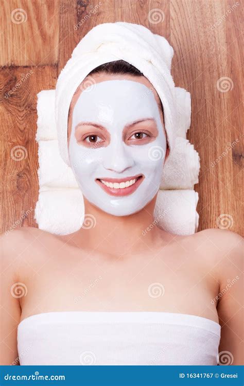 Woman With Cosmetic Mask On Her Face Stock Image Image 16341767