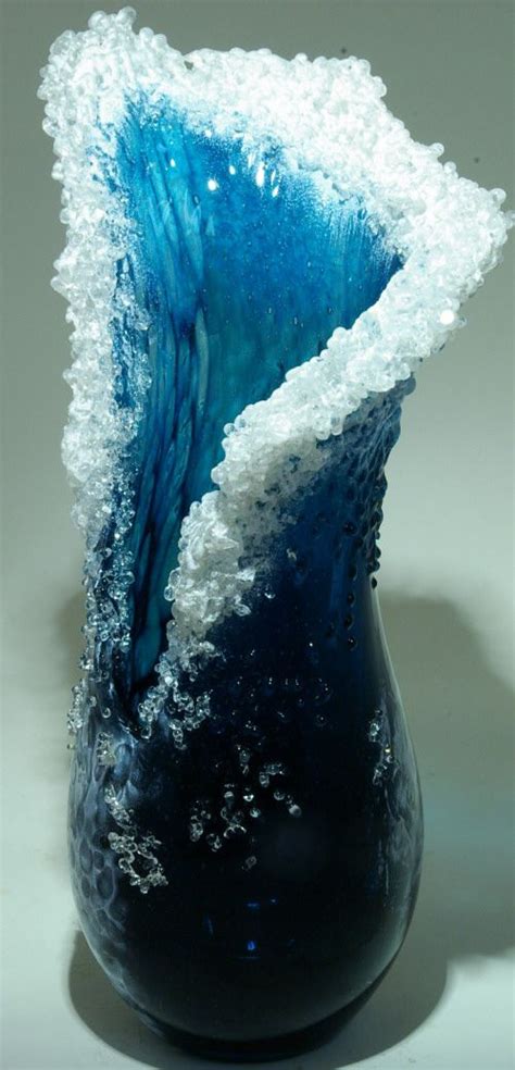 It was a project for art class that i had to do by stacking pieces of cardboard on top of one another and then painting it. Art Glass wave sculpture from Kela's...a glass gallery on ...