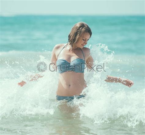 Happy Woman Having Fun In The Sea Stock Photo Crushpixel
