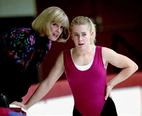 PORTLAND U S Figure Skating Champion Tonya Harding R Listens To
