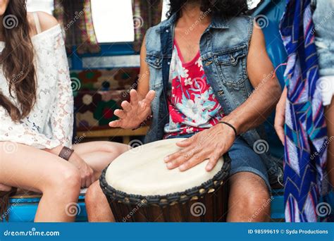 Close Up Of Hippie Friends Playing Tom Tom Drum Stock Image Image Of