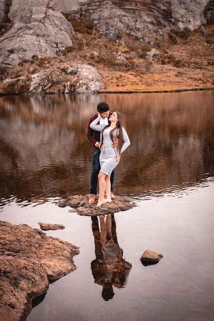 Premium Photo Elegant Loving Couple Gazing At Each Other In A Lake