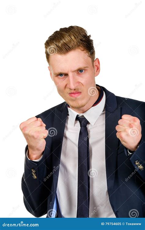Aggressive Angry Young Businessman Raised Hands And Squeezed Fists