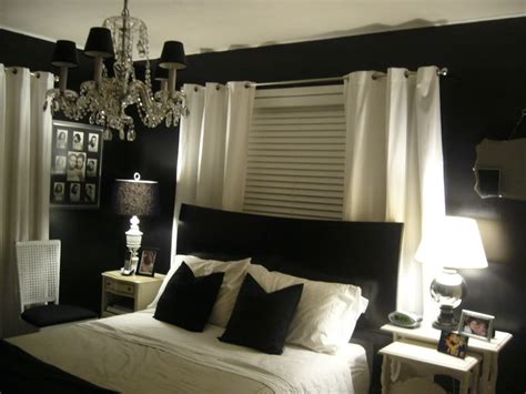 Black accent wall creates a perfect backdrop for the hanging led strip lights. HOME DESIGN: Plan for future inspiration sophisticated black and white bedroom designs