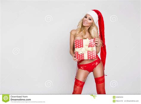 Beautiful Blonde Female Model Snowflake Dressed As Santa Claus Erotic Red Lingerie Stock Photo