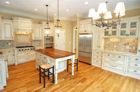 New 30 white kitchen cabinets with wood floors photos description: 32 Spectacular White Kitchens with Honey and Light Wood Floors (PICTURES)