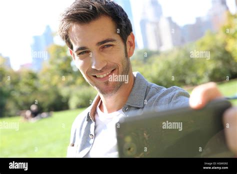Man Taking Picture Of Himself In Central Park Stock Photo Alamy