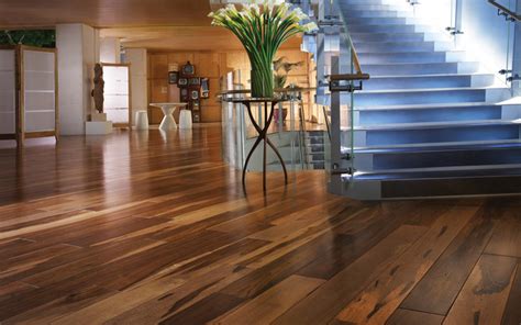 Wood flooring with light maple structure, white oak, or norwegian pine often become a decoration of modern interiors. What Are The Differences? Hardwood Flooring Vs. Laminate ...