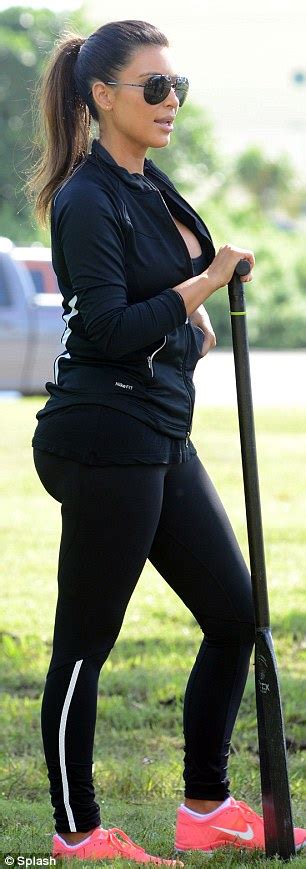 Kim Kardashian Displays Her Famous Curves And Cleavage As She Warms Up