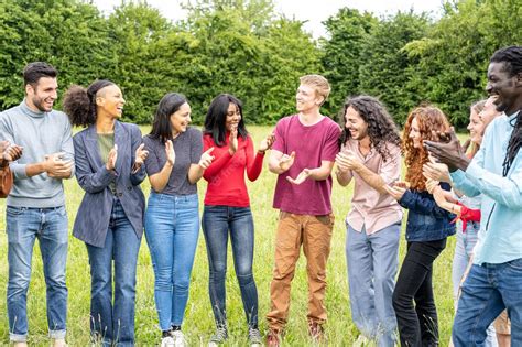 Premium Photo Multiracial Friends Clapping Hands Diverse Group Of
