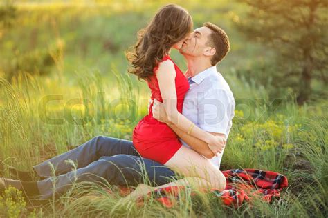 Hot Young Couple Kissing In Park Stock Image Colourbox