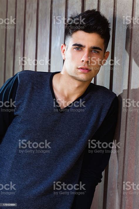 Portrait Of A Modern Male Fashion Model Stock Photo Download Image